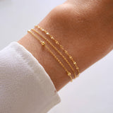 Victoire Collection Mehrreihiges Armband mit drei Ketten – Gold